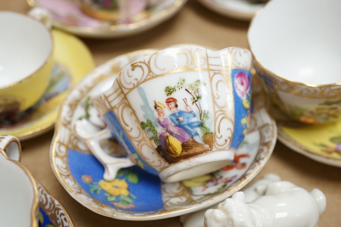 A group of 19th/20th century German porcelain, comprising a Nymphenburg pug, seven Dresden miniature cups and saucers and a Meissen bottle, largest 13cm high